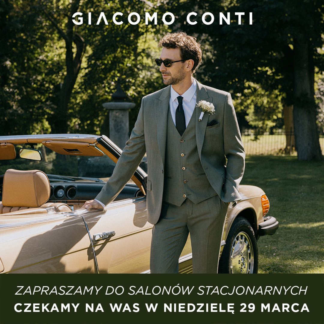 Mężczyzna w eleganckim garniturze obok klasycznego samochodu.