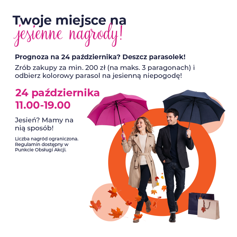Para z parasolkami na jesienne nagrody w Świdnickiej.